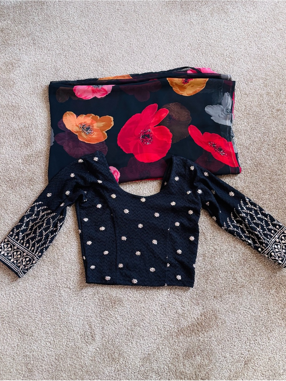 Black Floral Sheer Saree with Bold Red & Orange Blooms and black stretchy blouse - Picture 2 of 5